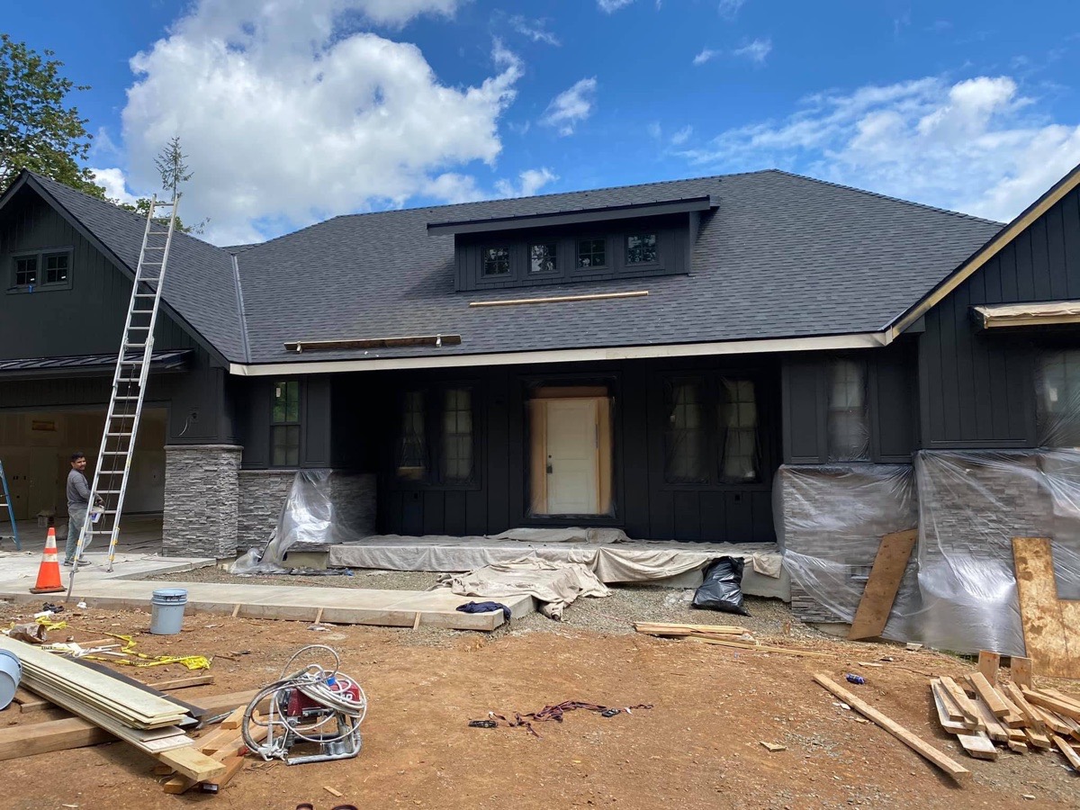 Exterior painting project on a custom home